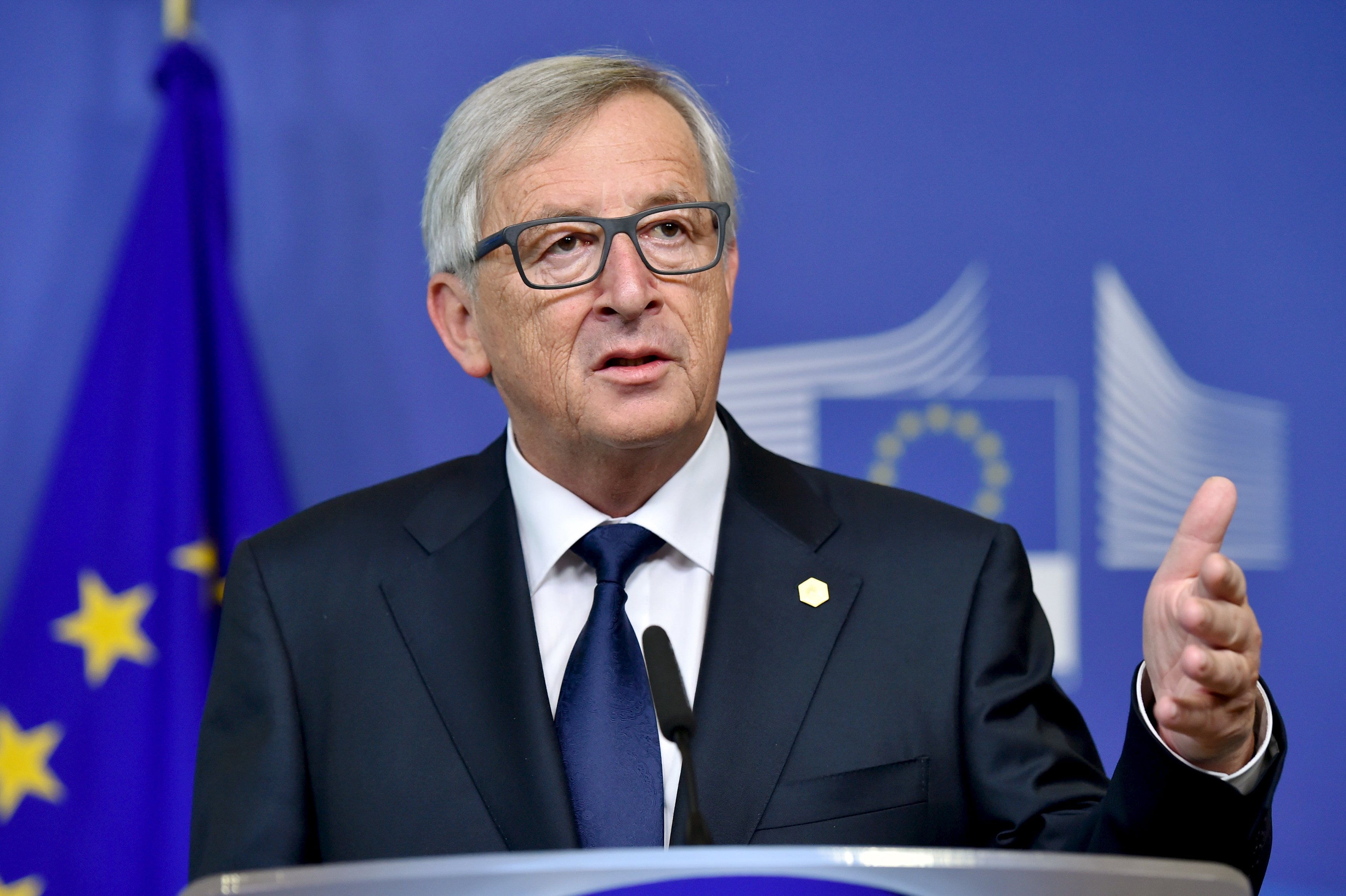 European Commission President Jean-Claude Juncker gives a joint news conference with European Parliament President Martin Schulz at the European Commission headquarters prior to an extraordinary summit in Brussels